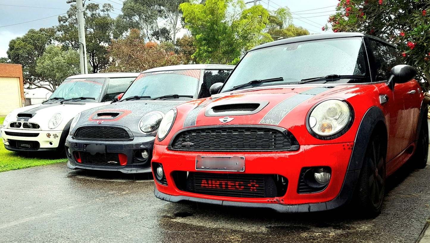 Airtec front mount intercooler for an r56 mini cooper s R55, R56 installed on car in red
