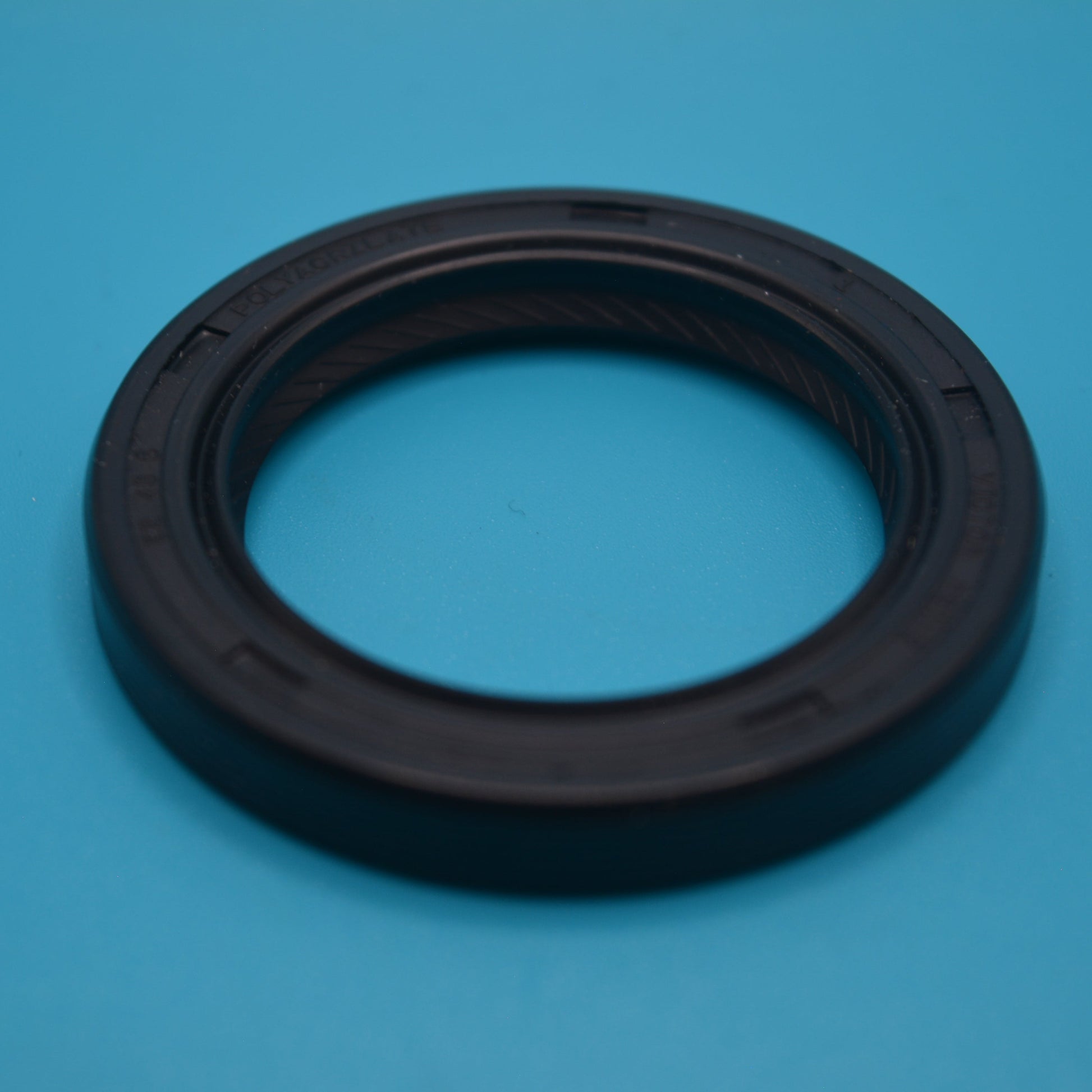 Black front crank seal for a mini cooper vehicle.