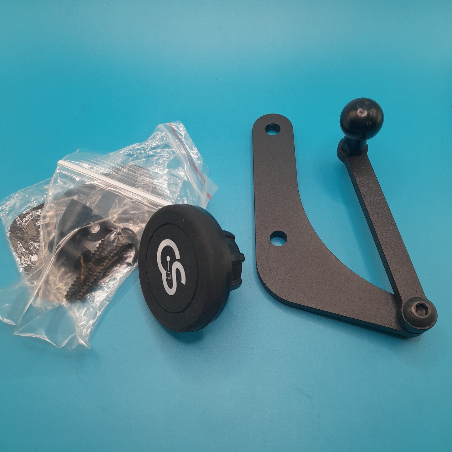 A black steel bracket mount with a magnetic attachment system, designed for attaching a phone to a mini cooper gauge cluster, suit r50,r52&r53mini models