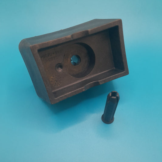 A gray lifting pad or jacking point pad with a hole for attachment and a PLASTIC  pin  for mini cooper gen1 models R50,R52 and R53