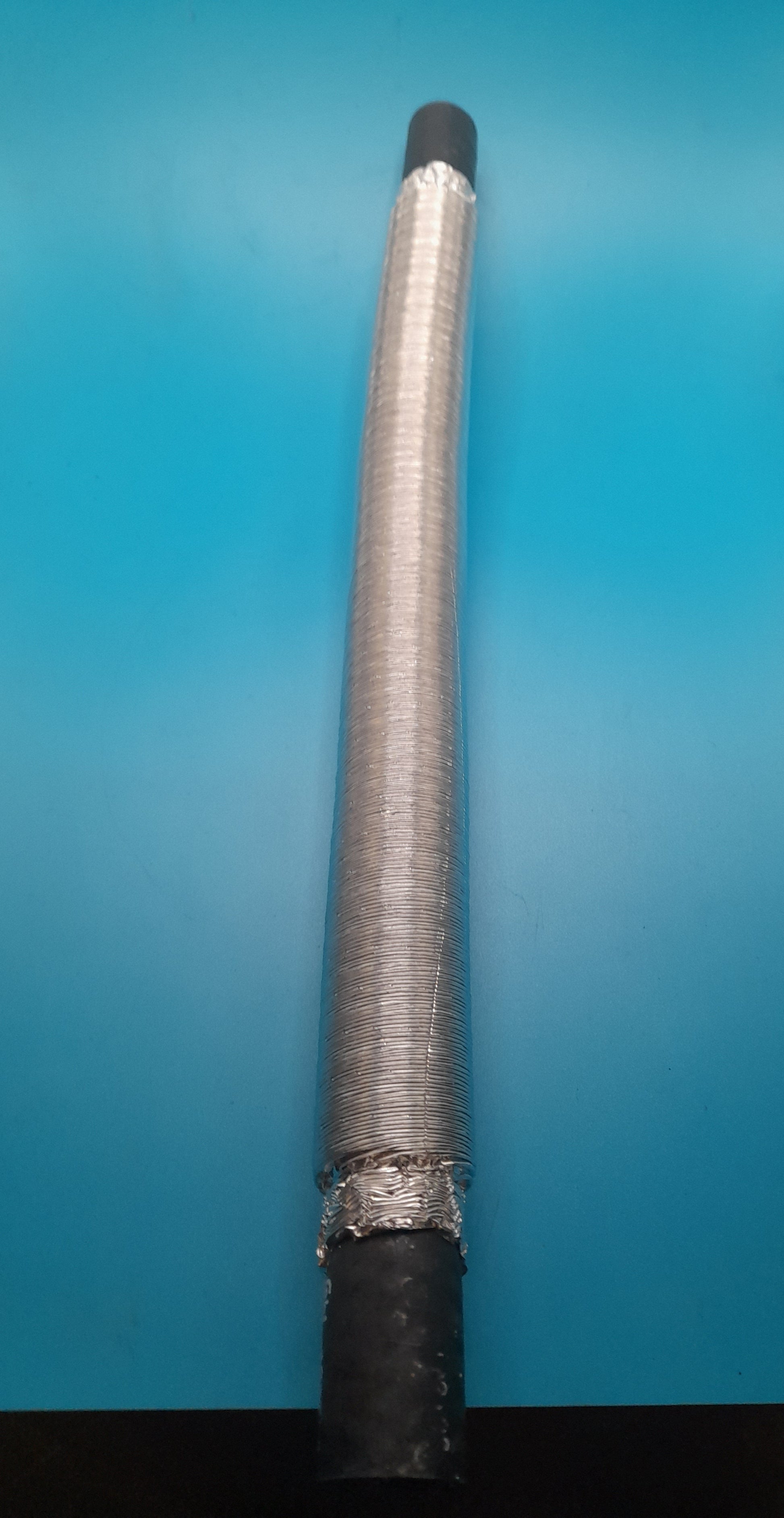 A power steering pump feed hose with shielding for mini cooper models R50,R52 & R53 Na and cooper s.