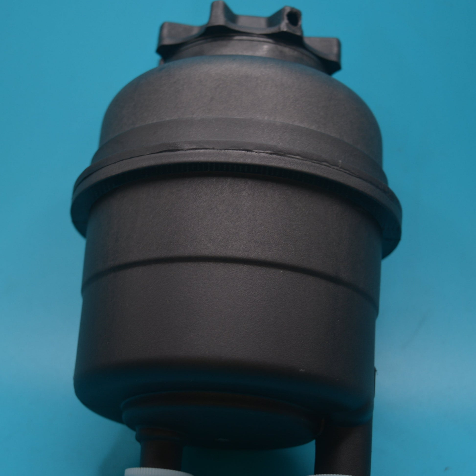 Aftermarket replacement power steering bottle for MINI R50, R52, and R53.