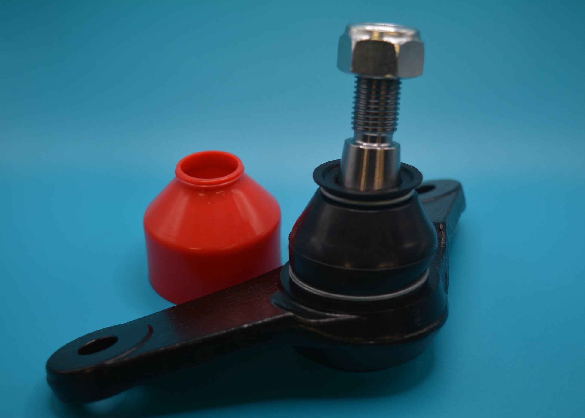 Inner ball joint for vehicles, displayed on a blue background, with a red protective cap removed to suit mini cooper