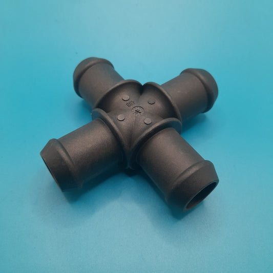 A black heater hose cross connection fitting for a Mini Cooper vehicle.