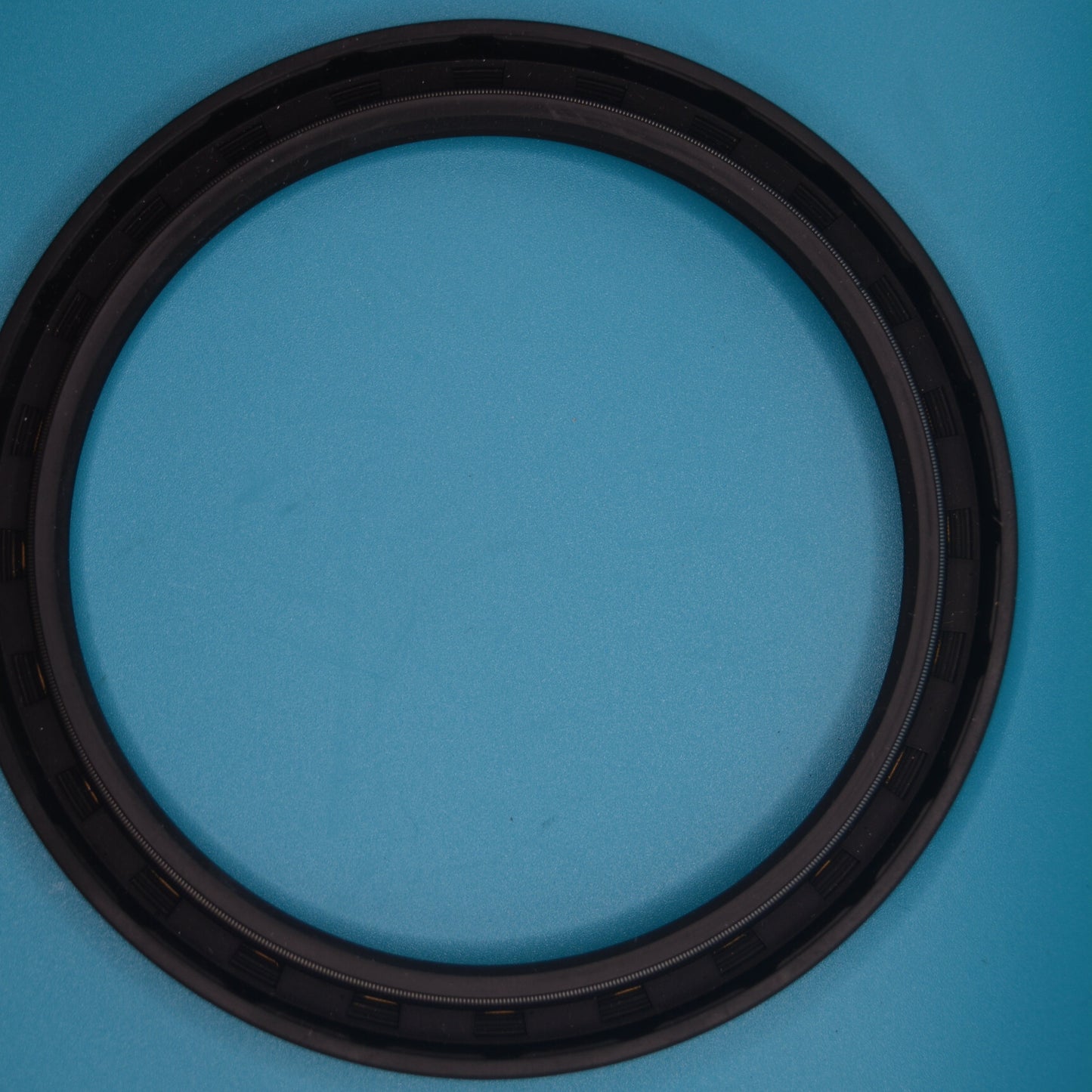 A black rear main seal for Mini Cooper models R50, R52, and R53 