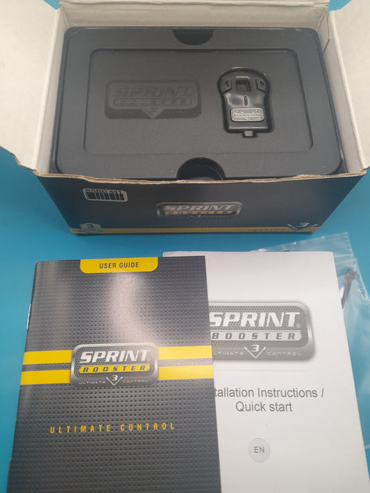 The image shows the Sprint Booster v3 product packaging, which includes a black box with a silver logo, a user manual, and installation instructions. An actual product is visible inside the box.