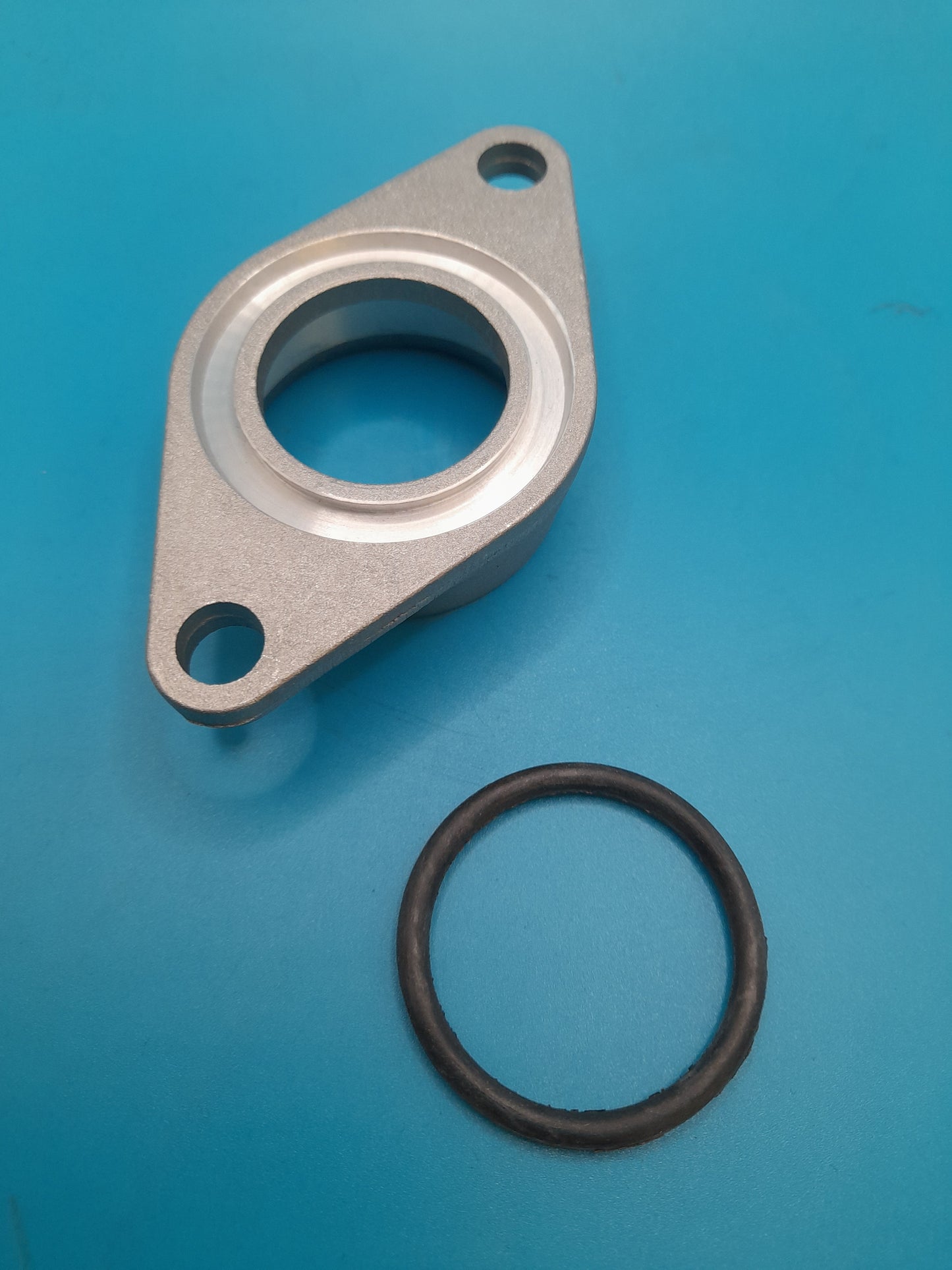 Supercharged Mini Cooper s Water pump to engine block flange plate